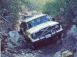 Nice rock here. I bend my fender flares on the way in,
and fix them on the way out.
